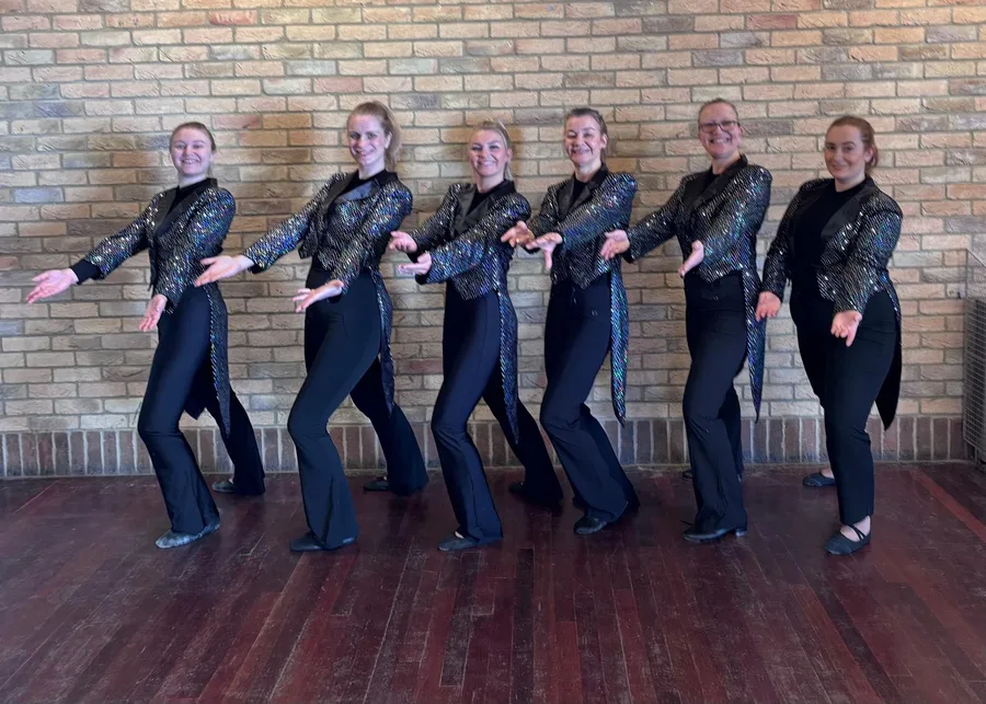 Adult dance class in sequinned tailcoats at Karen Chapman School of Dancing in Harlow